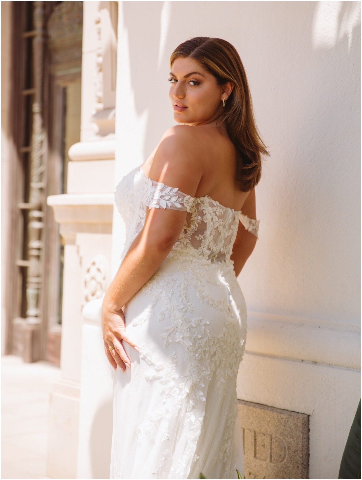 Photo of the model wearing a Plus size gown