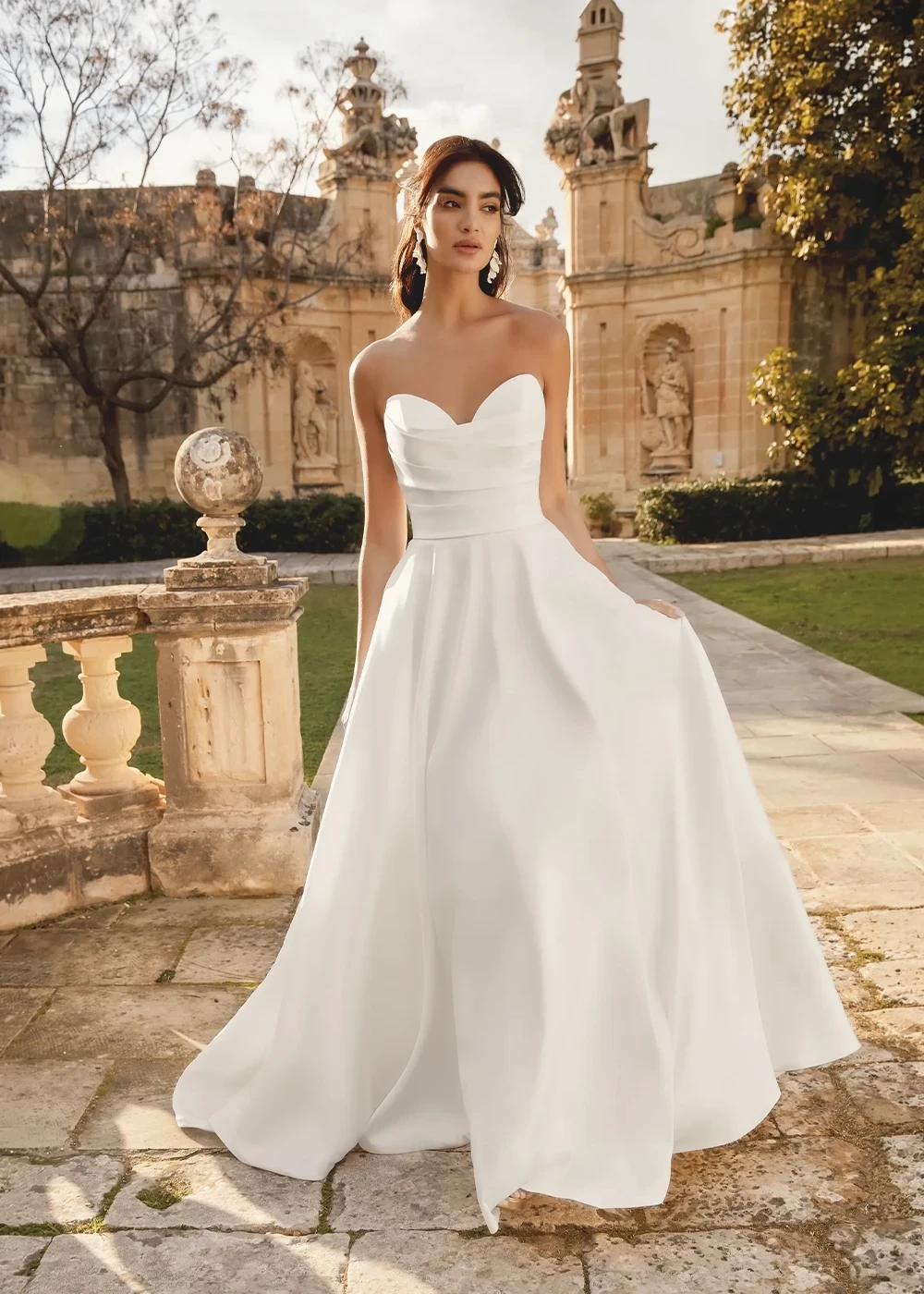 Photo of a bride wearing a Minimalistic and Modern bridal gown.
