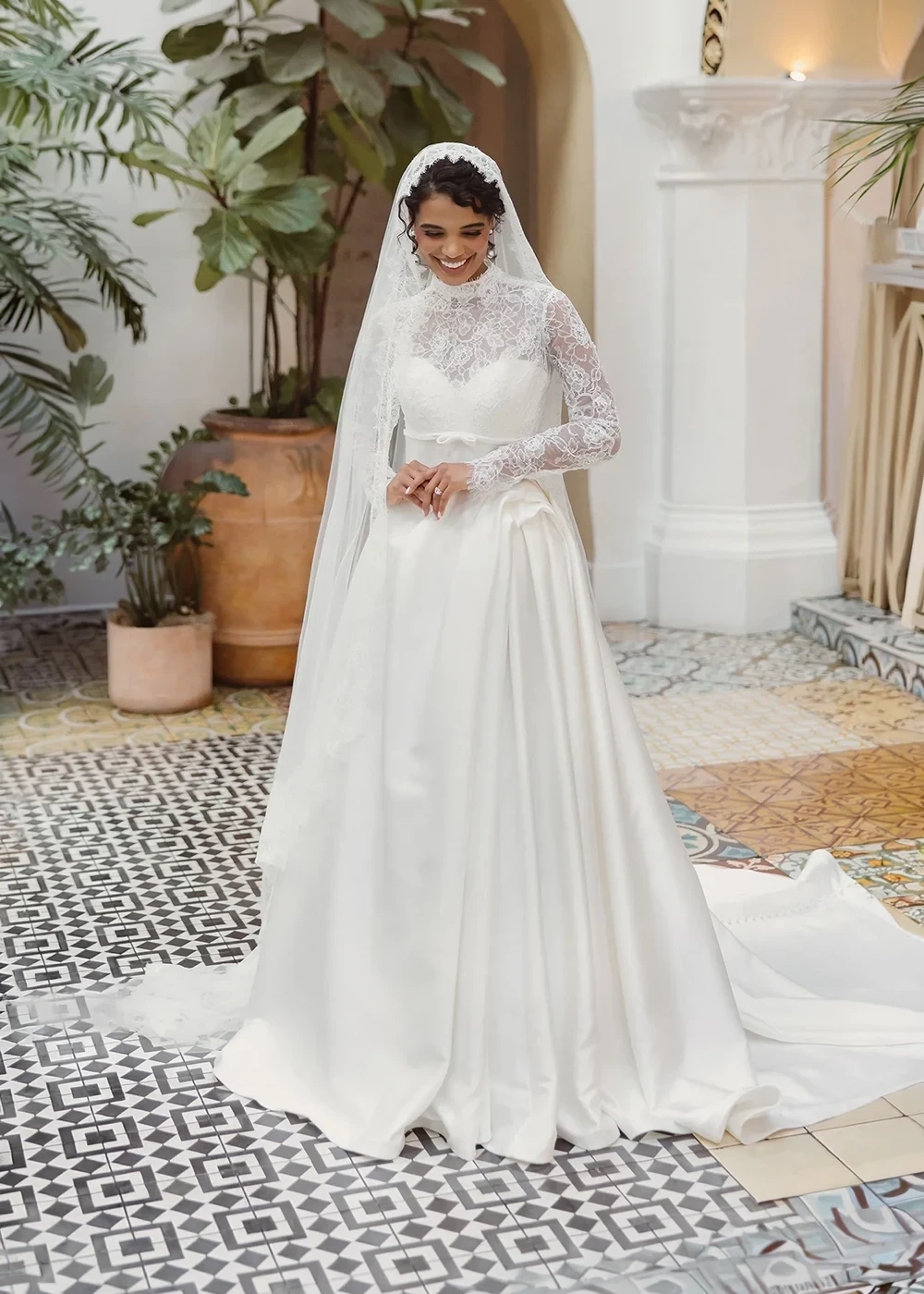 Photo of a bride wearing a Romantic and Traditional bridal gown.